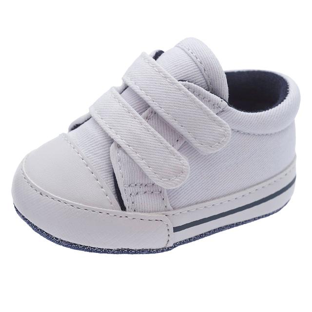 Sneakers unisex Chicco Ovis bianche in tessuto, con chiusura a doppio strappo e imbottitura posteriore per il massimo comfort. | Chicco