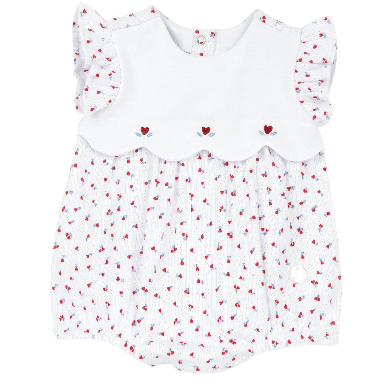 Pagliaccetto corto bianco in cotone sostenibile per bambina, con stampa floreale, effetto smerlato e grafica ricamata. | Chicco