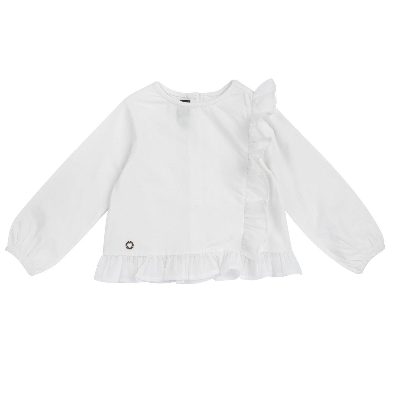 Maglietta a manica lunga bianca in jersey elasticizzato per bambina Chicco con balze in voile sul davanti e sul fondo, arricchita da medaglietta cuore. | Chicco