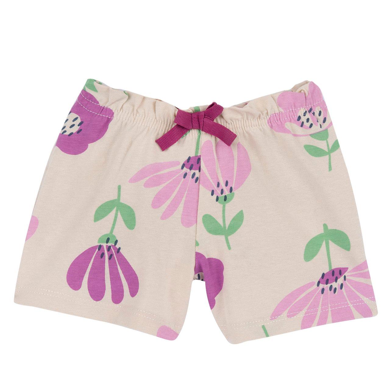 Pantaloni corti bianchi Chicco per bambina in felpa elasticizzata con stampa a macrofiori e fiocchetto in vita, realizzati in cotone sostenibile Oeko-Tex. | Chicco