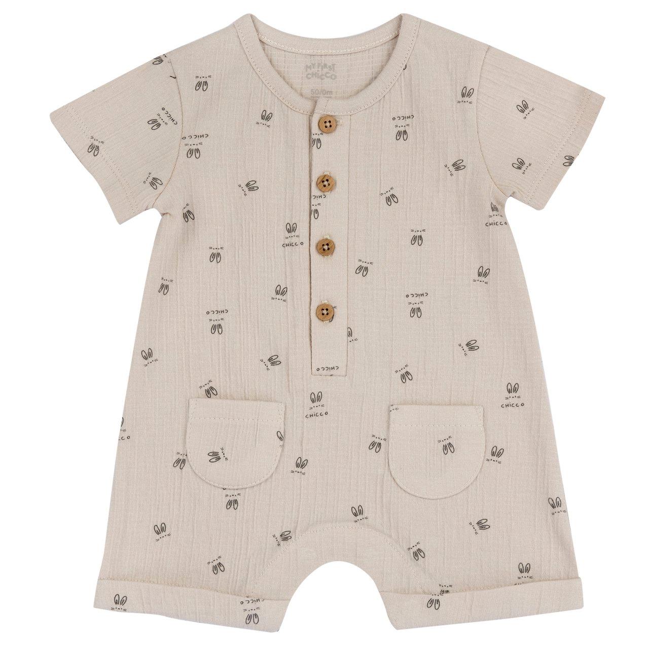 Pagliaccetto corto unisex Chicco in cotone arancione effetto goffrato, con bottoni effetto legno e taschine applicate, ideale per primavera ed estate. | Chicco