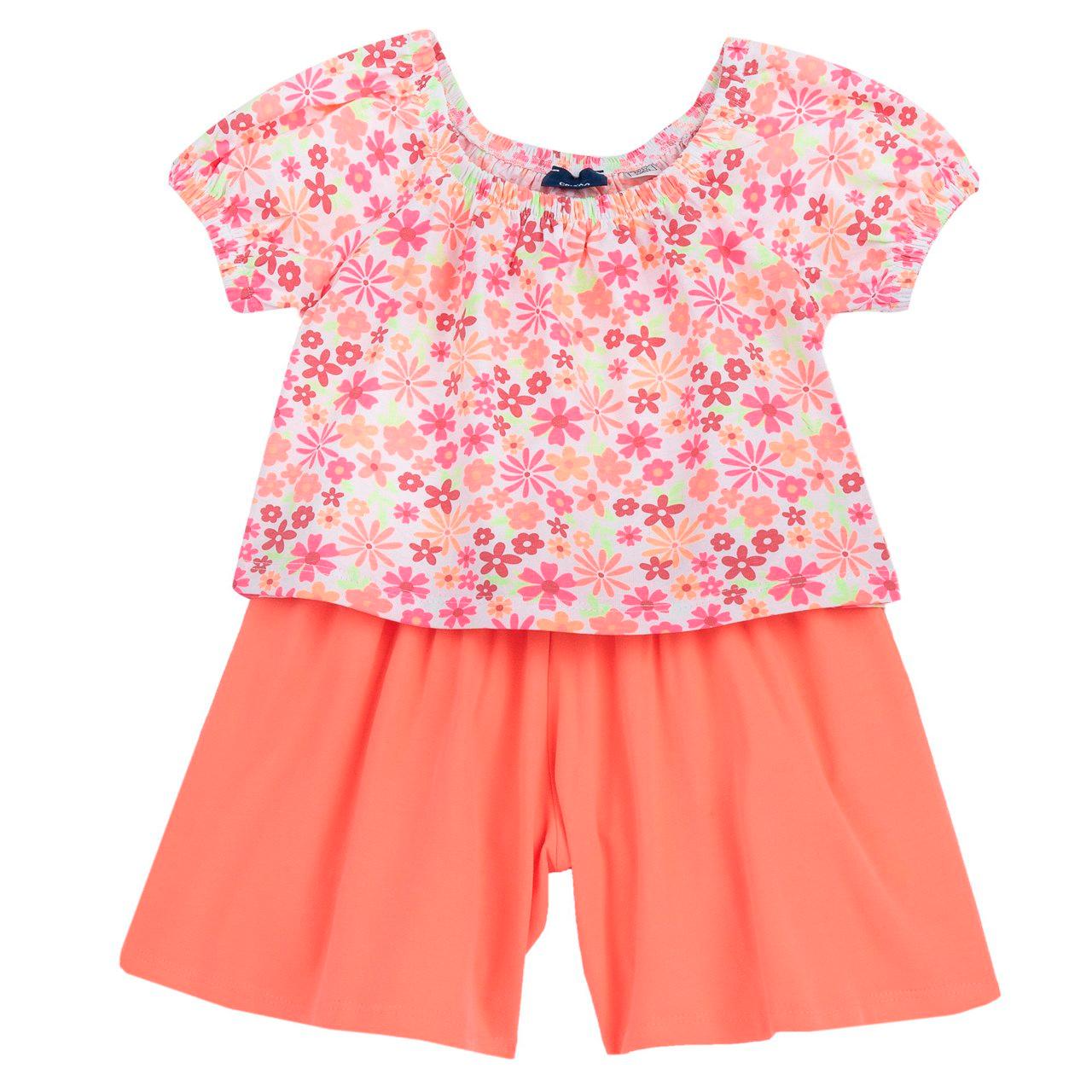 Completo mare Chicco per bambina con maglietta fantasia floreale arancione e pantaloni corti in cotone sostenibile, certificato Oeko-Tex. | Chicco