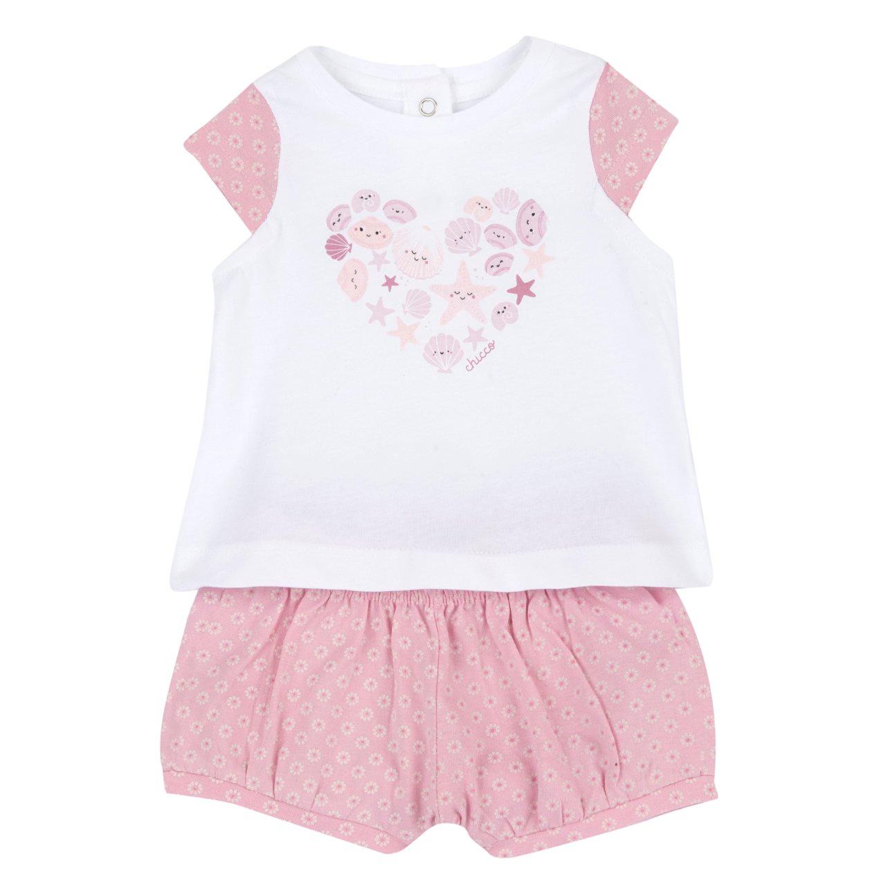 Completo mare Chicco per bambina rosa con maglietta manica ad aletta e pantaloni corti fantasia micromargherite in cotone sostenibile. | Chicco