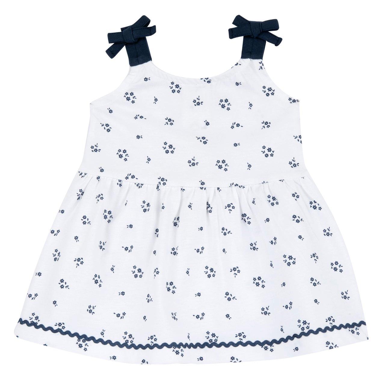 Vestito con bretelline per bambina Chicco in 100% cotone sostenibile, con stampa fantasia di microfiorellini bianchi su fondo bianco e dettagli in gros grain. | Chicco