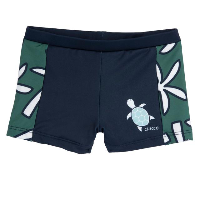Costume parigamba blu per bambino Chicco con stampa tartaruga sul davanti e fantasia di palme, realizzato in tessuto tecnico riciclato per la primavera/estate. | Chicco