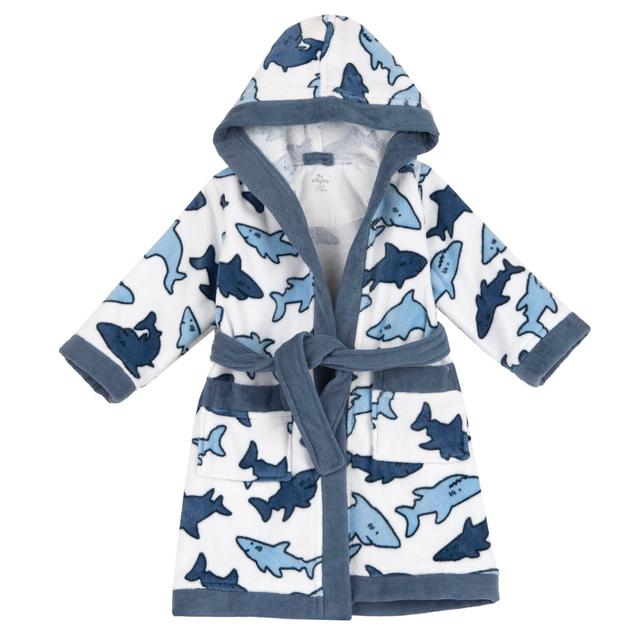 Accappatoio Chicco per bambino in spugna di cotone bianco con vivace stampa fantasia di squali, cappuccio, tasche e cintura. | Chicco