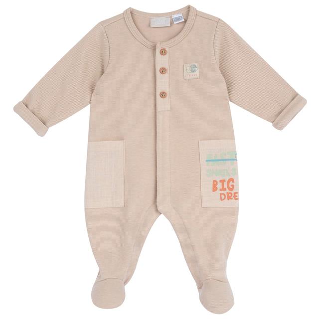 Tutina unisex Chicco bianca aperta davanti in piquet elasticizzato, con bottoni effetto legno e tasconi stampati, ideale per primavera/estate. | Chicco