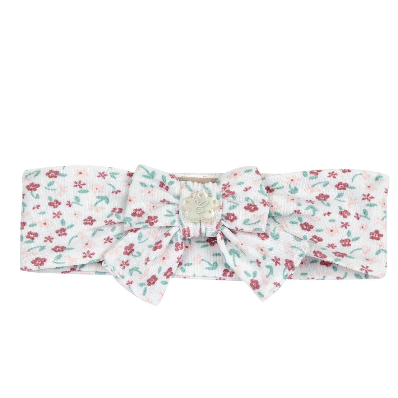 Fascetta Chicco bianca in morbido jersey di cotone elasticizzato con vivace stampa floreale, fiocco elegante e medaglietta madreperla. | Chicco