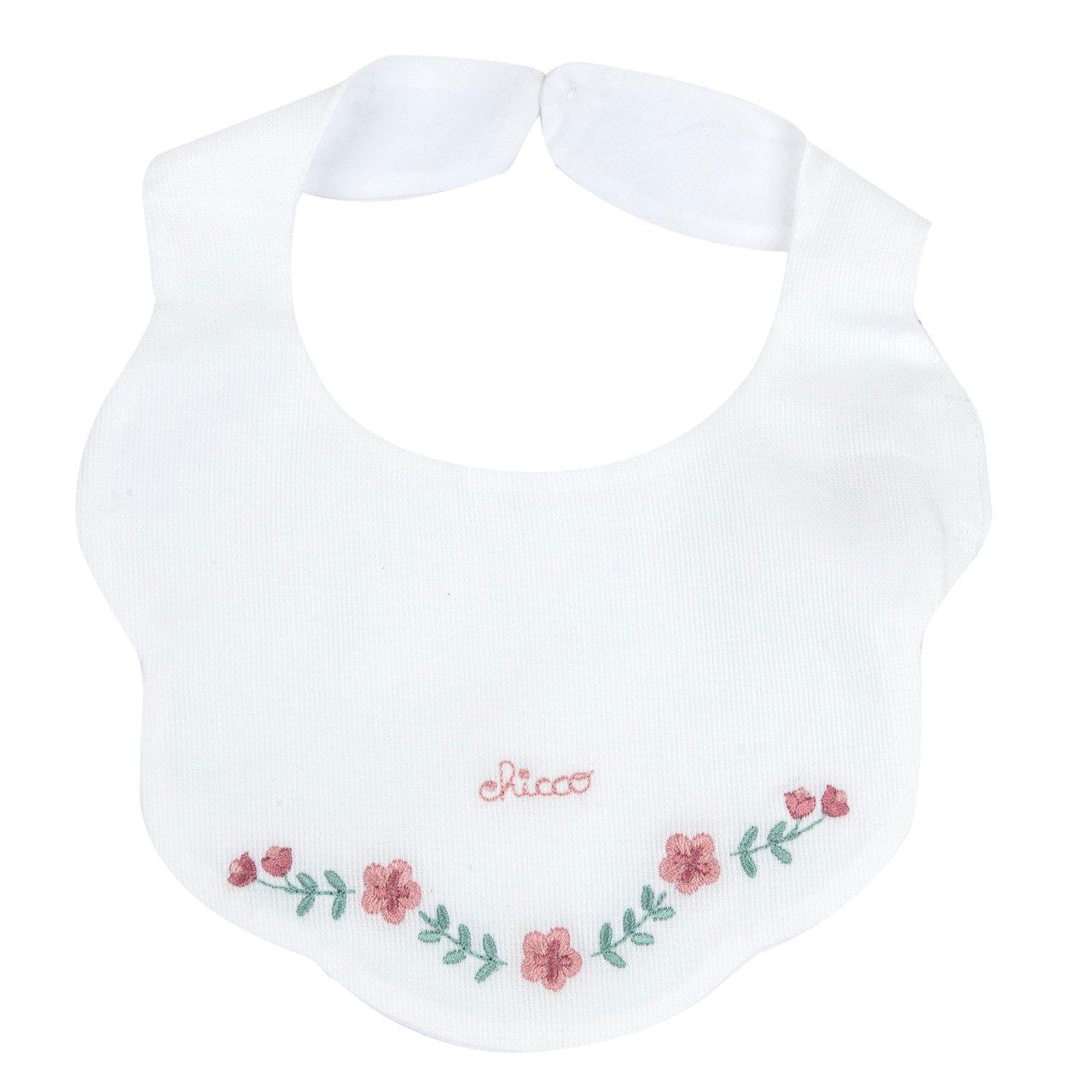 Bavaglino Chicco in piquet bianco per bambina, con ricamo floreale e chiusura a bottoncino, ideale per primavera/estate. | Chicco