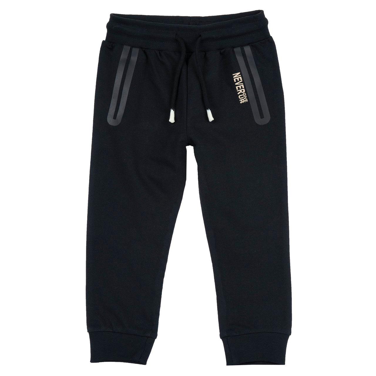 Pantaloni jogger lunghi bianchi in cotone sostenibile per bambino Chicco con vita elasticizzata, cordino regolabile e tasche decorative stampate. | Chicco