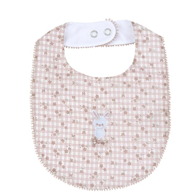 Bavaglino Chicco in mussola di cotone beige con stampa fantasia, fodera in jersey elasticizzato e apertura regolabile con bottoni automatici. | Chicco