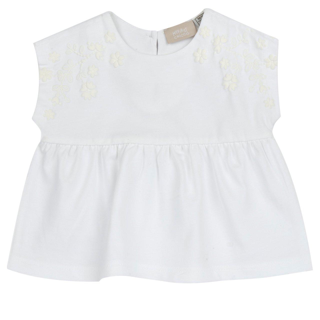 Maglietta a maniche corte bianca Chicco per bambina con stampa floreale in rilievo, realizzata in morbido jersey elasticizzato di cotone sostenibile Oeko-Tex. | Chicco