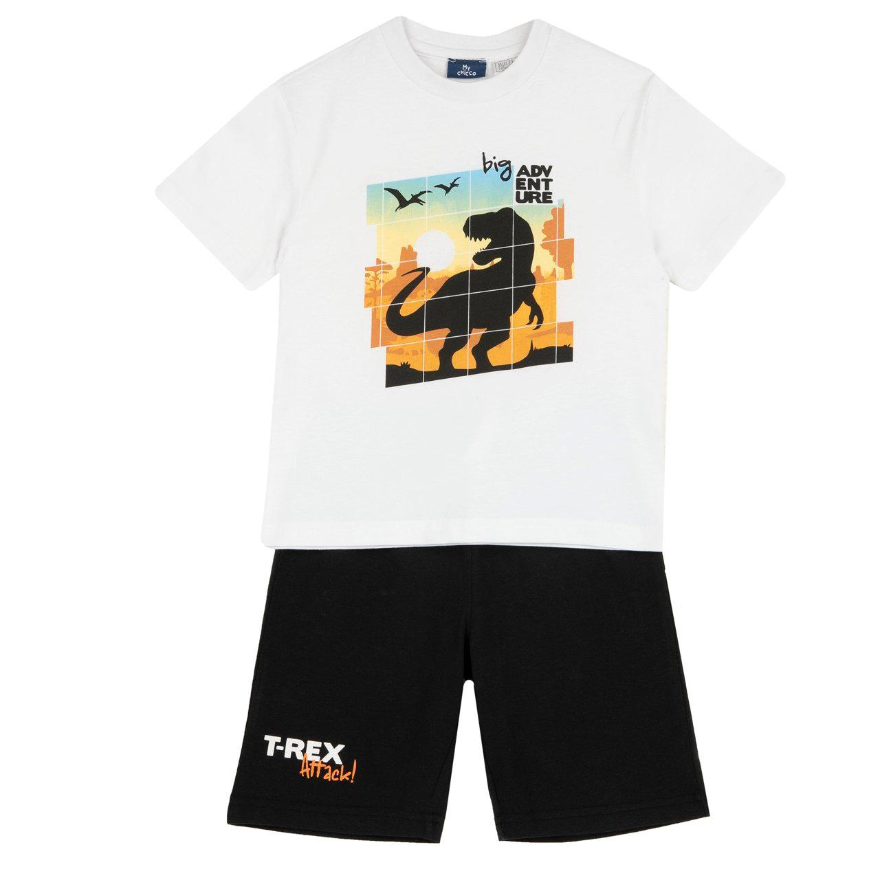 Completo estivo per bambino Chicco con maglietta bianca a maniche corte e stampa dinosauro, abbinato a pantaloni corti con tasca posteriore. | Chicco