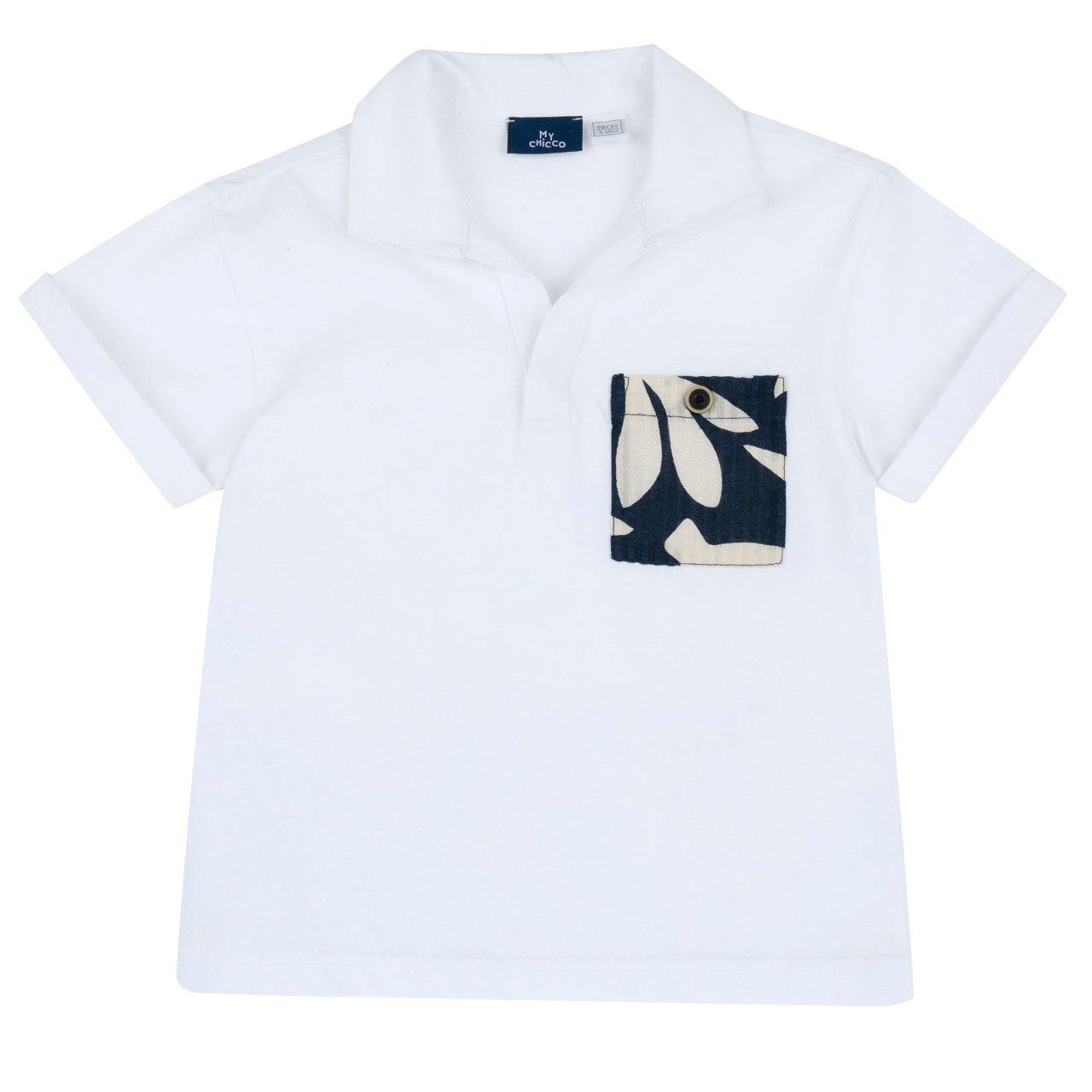 Polo Chicco a manica corta in cotone bianco con tasca fantasia floreale e chiusura a bottoncino automatico, ideale per la primavera/estate. | Chicco