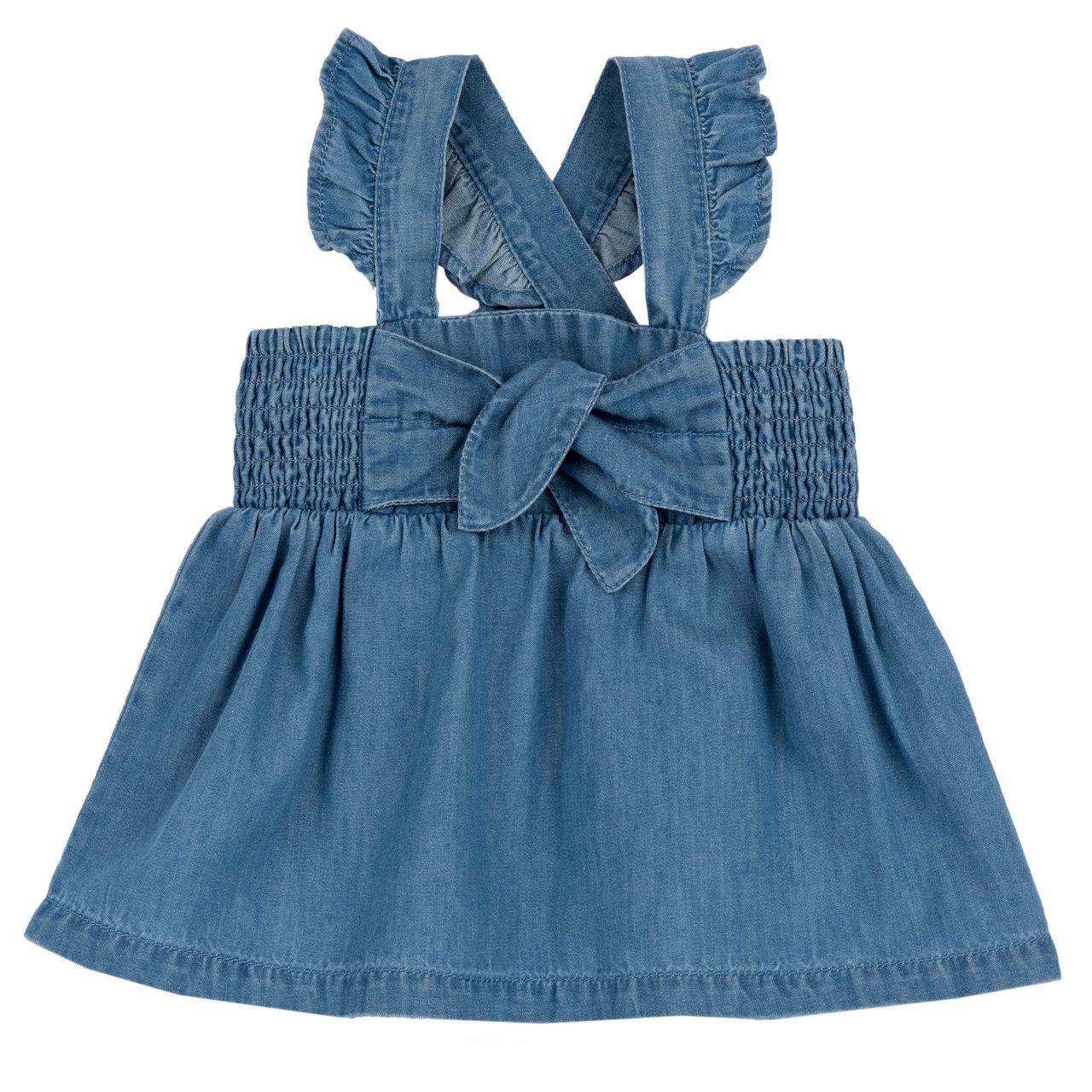 Salopette gonna in chambray azzurro per bambina Chicco con alette sulle spalline e fiocco annodato, in cotone sostenibile Oeko-Tex. | Chicco