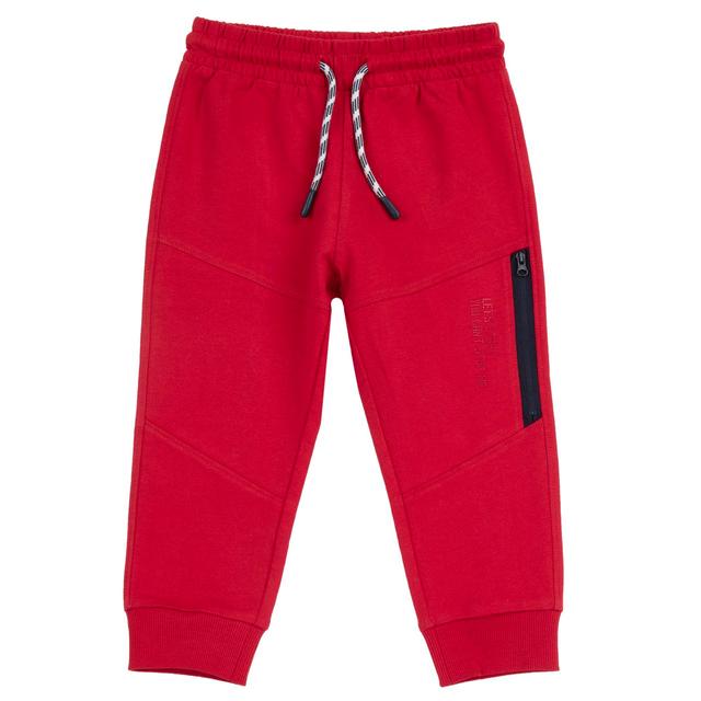 Pantaloni jogger lunghi rossi in cotone sostenibile Chicco per bambino, con vita elasticizzata, cordino, stampa a rilievo e tasca con zip sulla gamba. | Chicco