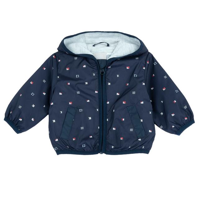 Giubbino antivento Chicco per bambino con stampa fantasia di dinosauri su sfondo azzurro, ideale per primavera/estate. | Chicco