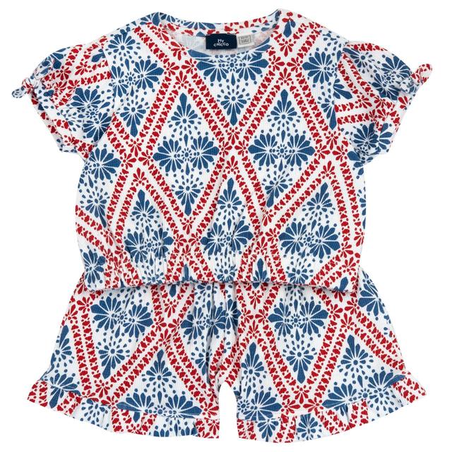 Completo estivo Chicco per bambina con maglietta a fantasia geometrica e pantaloni corti bianchi in jersey goffrato elasticizzato. | Chicco