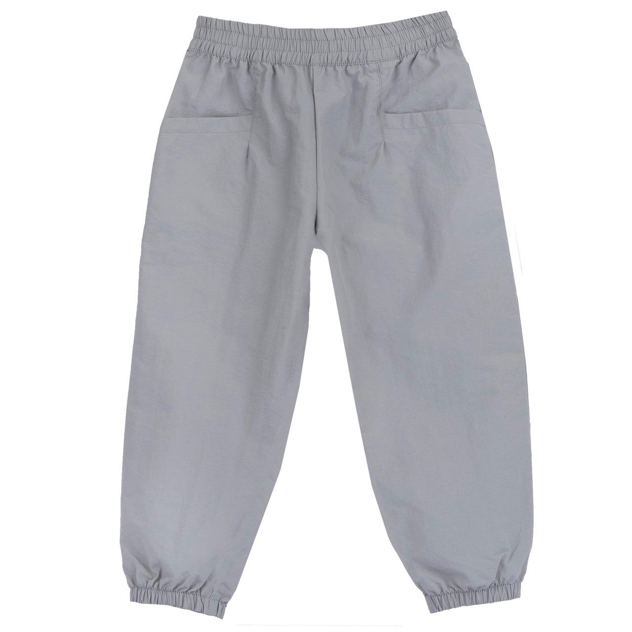 Pantaloni lunghi unisex Chicco bianchi in poliammide, con vita e fondo elasticizzati e tasche frontali, in vestibilità baggy fit. | Chicco