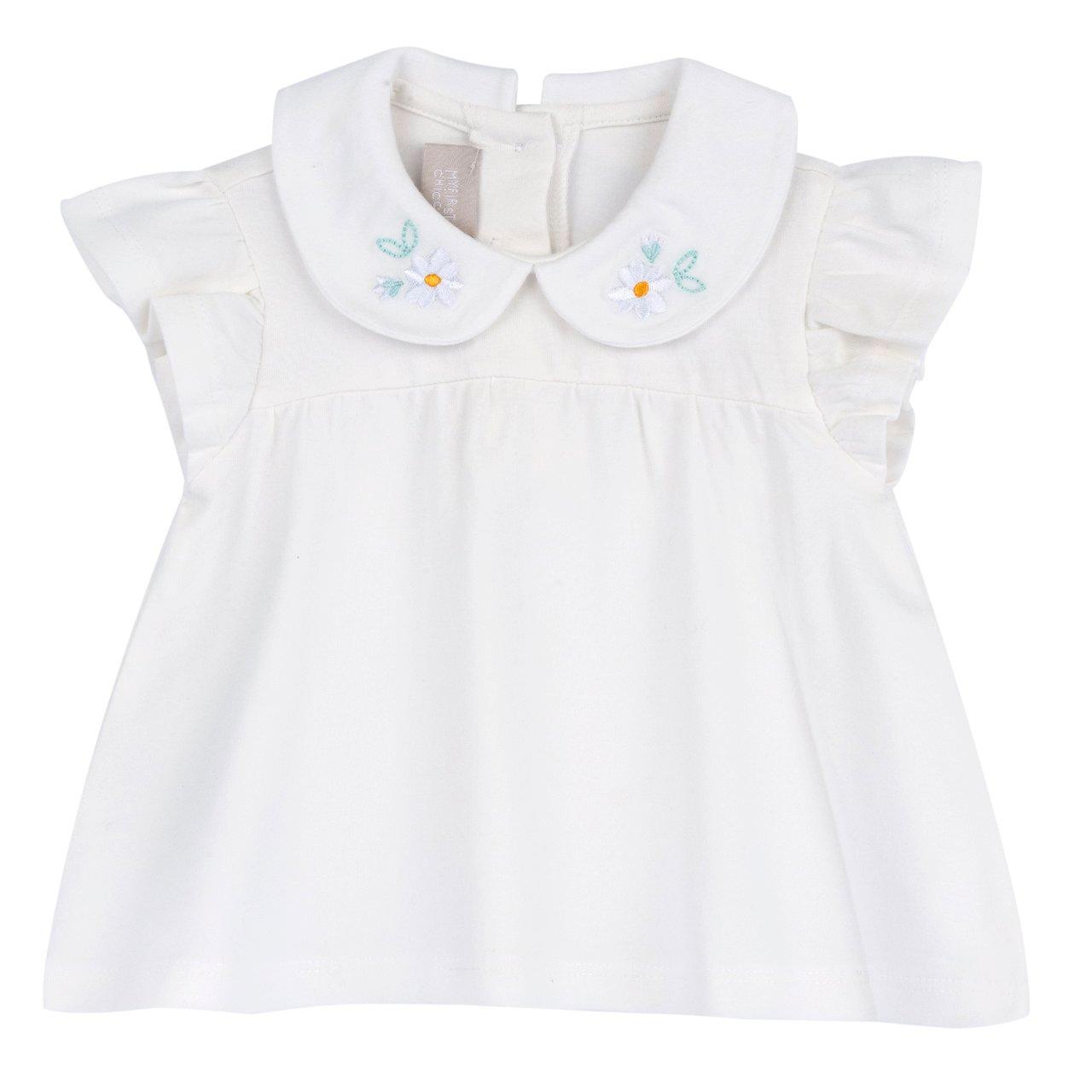 Maglietta manica corta bianca per bambina Chicco con collo baby ricamato a fiorellini e bottoncini posteriori a forma di fiore. | Chicco