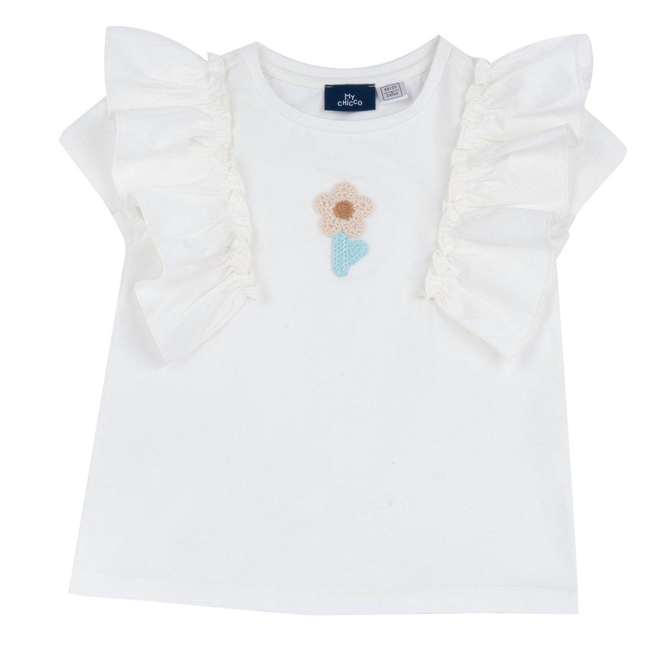 Maglietta manica corta bianca per bambina con rouches in popeline di cotone e fiorellino in crochet, parte della collezione Chicco. | Chicco