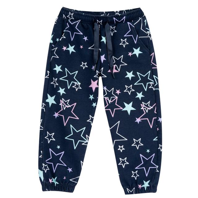 Pantaloni jogger lunghi da bambina Chicco in morbido cotone sostenibile, con vivace stampa a fantasia stelle e vita elasticizzata con cordino in satin, colore blu. | Chicco