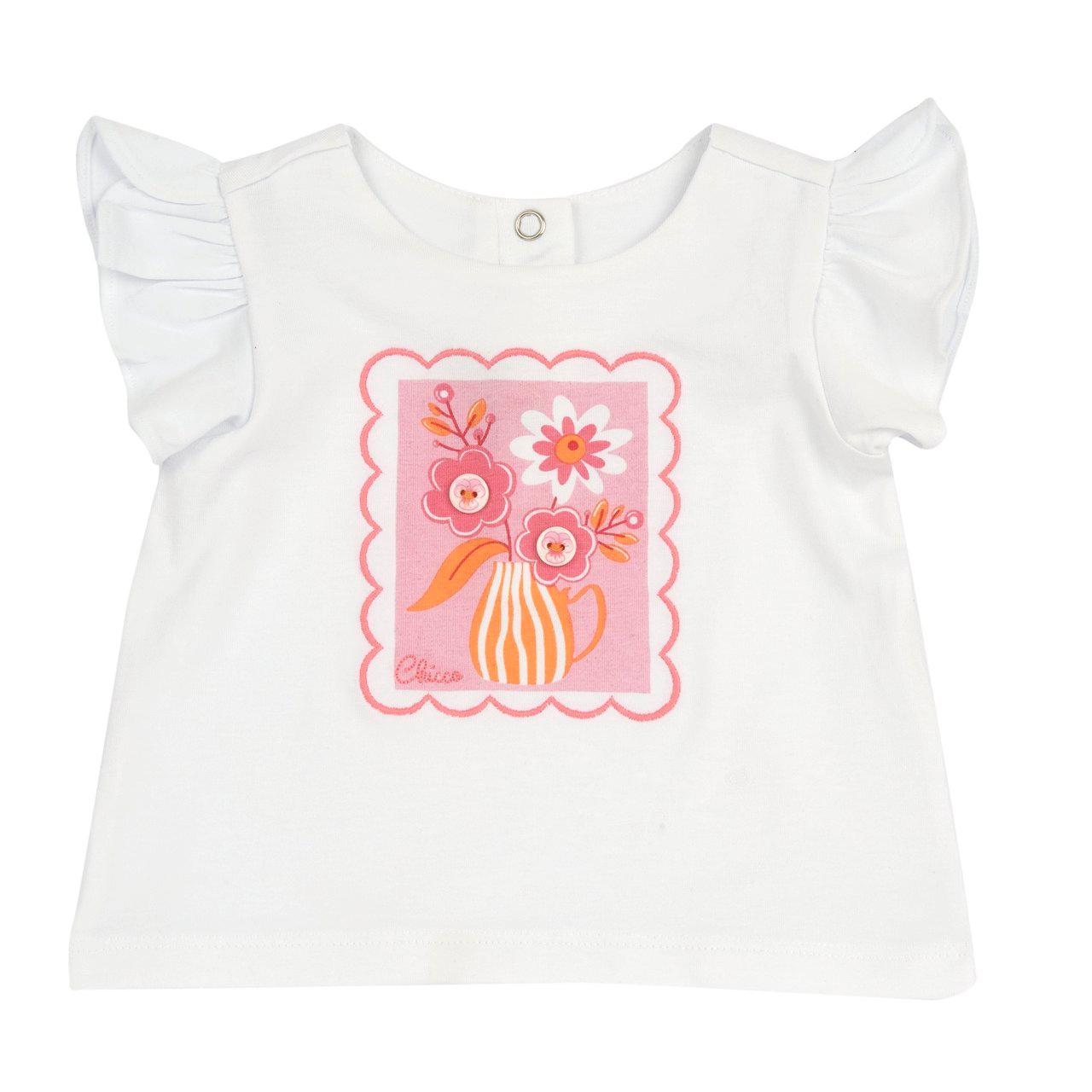 Maglietta bianca a maniche corte per bambina con stampa floreale e ricamo effetto francobollo, parte della collezione Chicco. | Chicco