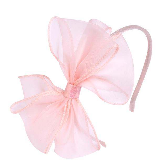 Cerchietto in organza rosa con fiocco laterale, parte della nuova collezione Chicco, ideale per occasioni speciali. | Chicco