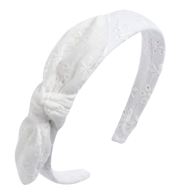 Cerchietto in sangallo con fiocco laterale a nodo e ricamo floreale, ideale per bambina e con ottima tenuta dei capelli. | Chicco