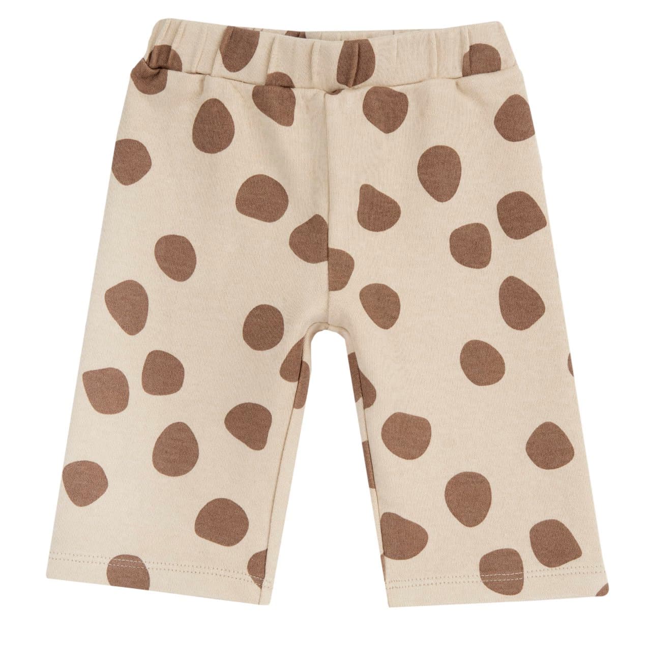Pantaloni lunghi bianchi Chicco da bambina in interlock elasticizzato con macro pois, vita elasticizzata e certificazione Oeko-Tex, ideali per l'autunno/inverno. | Chicco