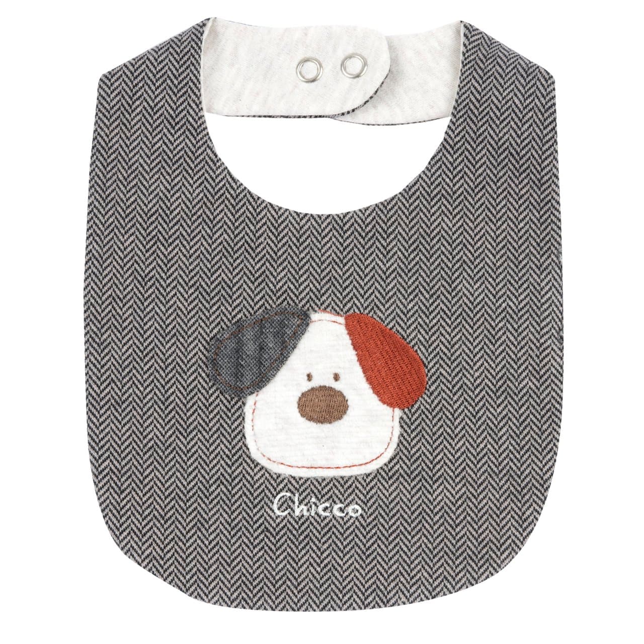 Bavaglino Chicco in interlock jacquard marrone con ricamo e applicazione, ideale per neonato autunno/inverno, con chiusura automatica regolabile e certificazione Oeko-Tex. | Chicco