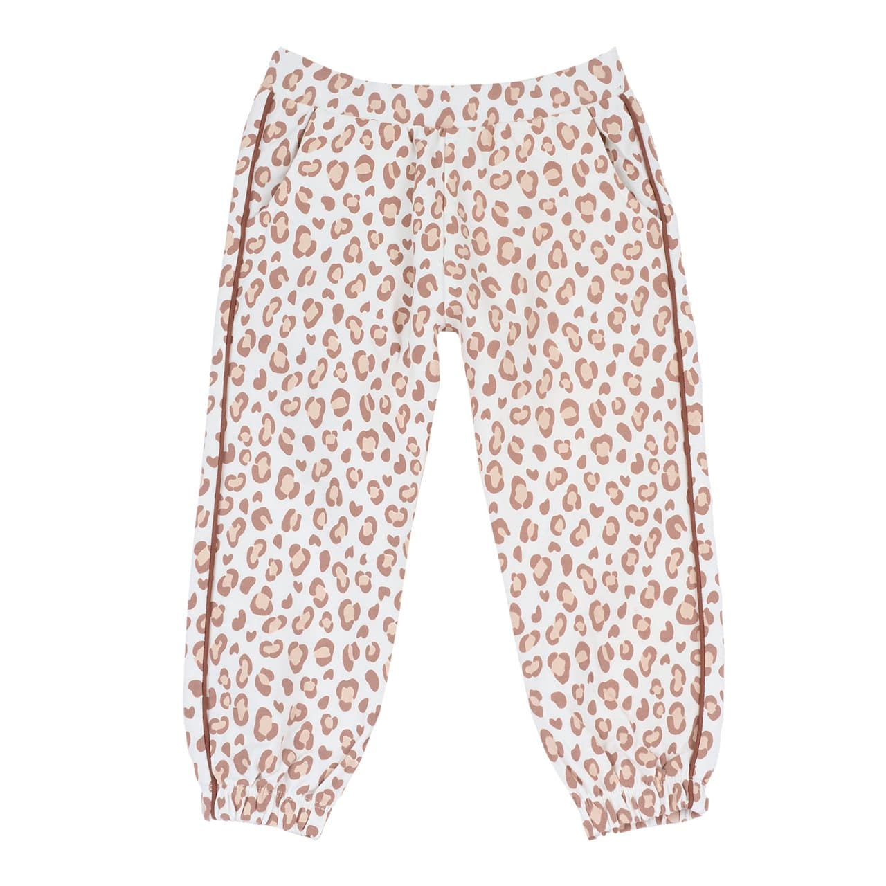 Pantaloni lunghi jogger Chicco da bambina in felpa elasticizzata di cotone beige con stampa maculata, vita e polsini elasticizzati e tasche frontali, ideali per l'autunno/inverno. | Chicco