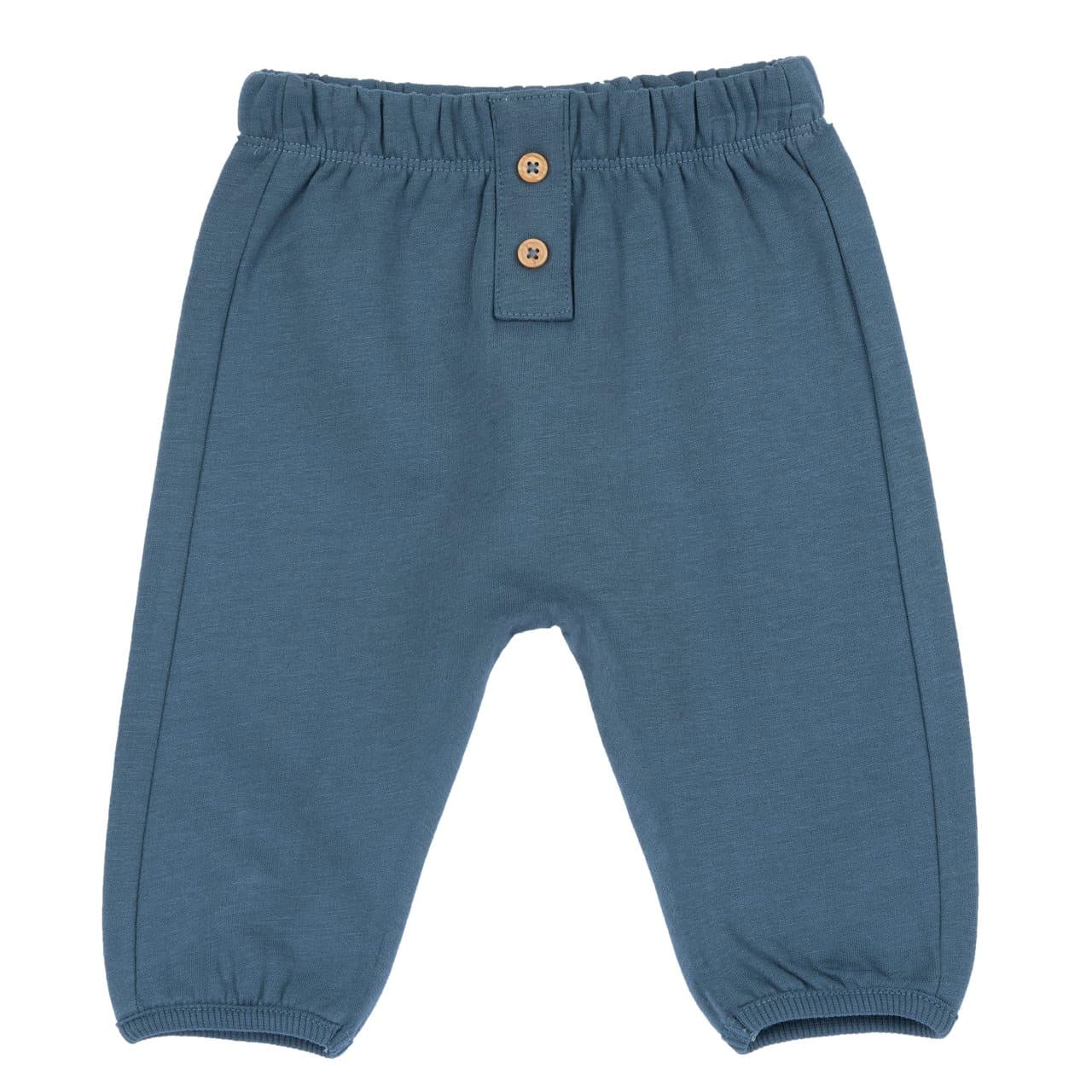 Pantaloni lunghi in felpa azzurra Chicco per bambino, con vita elasticizzata e finta apertura frontale con bottoncini effetto legno, ideali per l'autunno/inverno. | Chicco