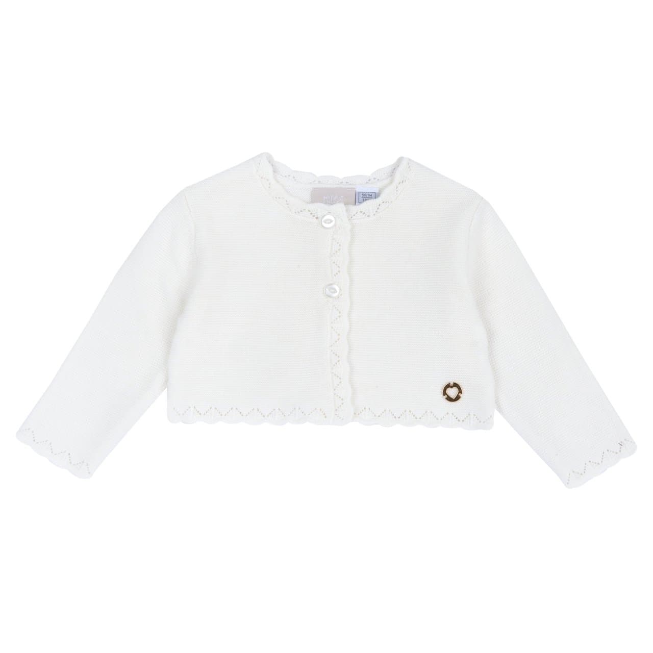 Cardigan In Maglia | Chicco Cardigan in maglia bianco Chicco per bambina con lavorazione traforata su collo, apertura frontale, polsini e bordo. Chiusura con bottoncini effetto madreperla e medaglietta metallica a cuore. | Chicco