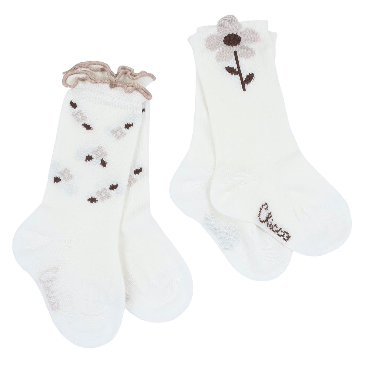 Set Due Paia Calzini Gambaletto Jacquard | Chicco Set due paia di calzini gambaletto Chicco per bambina in misto caldo cotone, bianco, con fantasia floreale jacquard e margherita, ideali per autunno/inverno. | Chicco