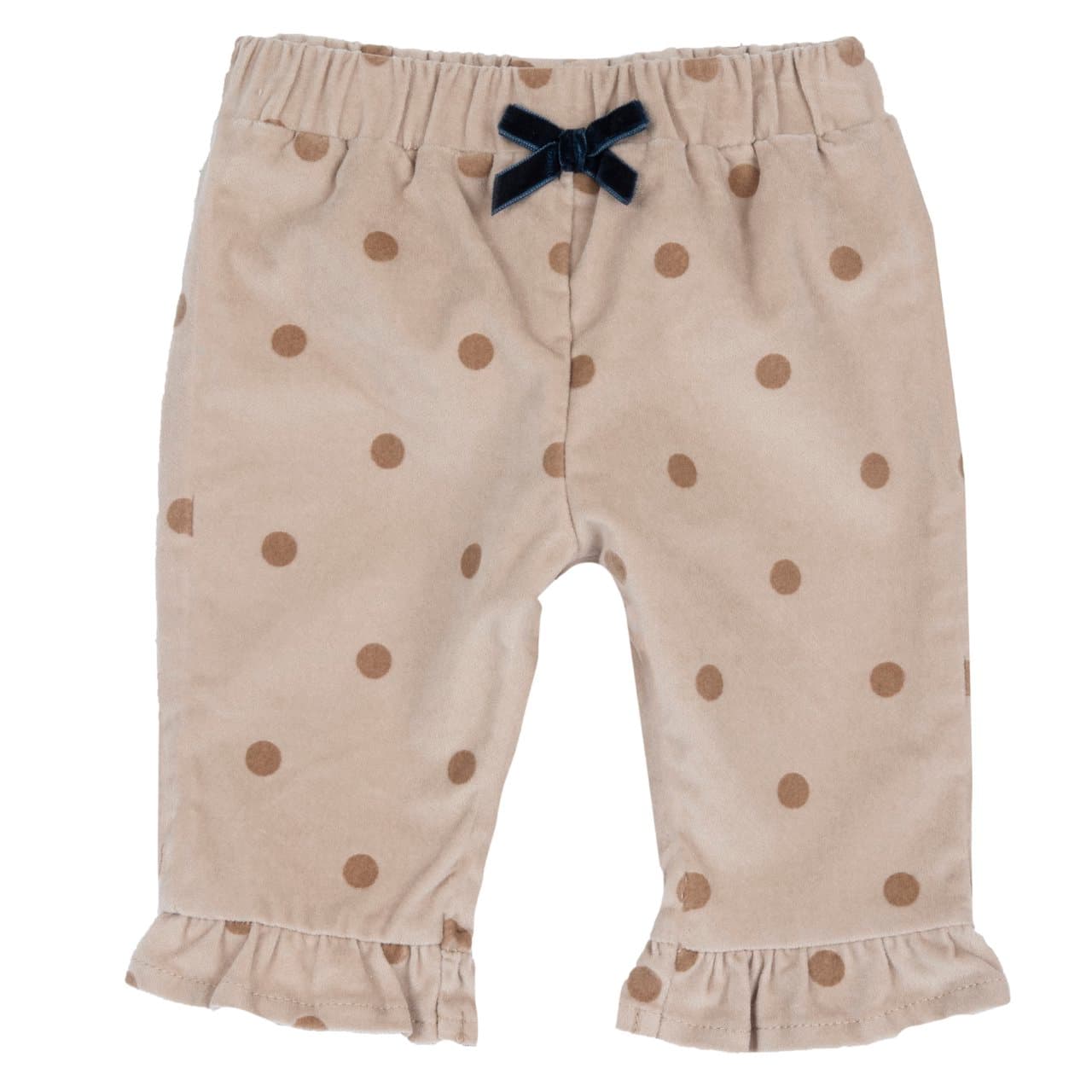 Pantaloni Lunghi In Velluto | Chicco Pantaloni lunghi da bambina Chicco bianchi in morbido velluto elasticizzato con stampa a pois e fiocchetto sul girovita. | Chicco