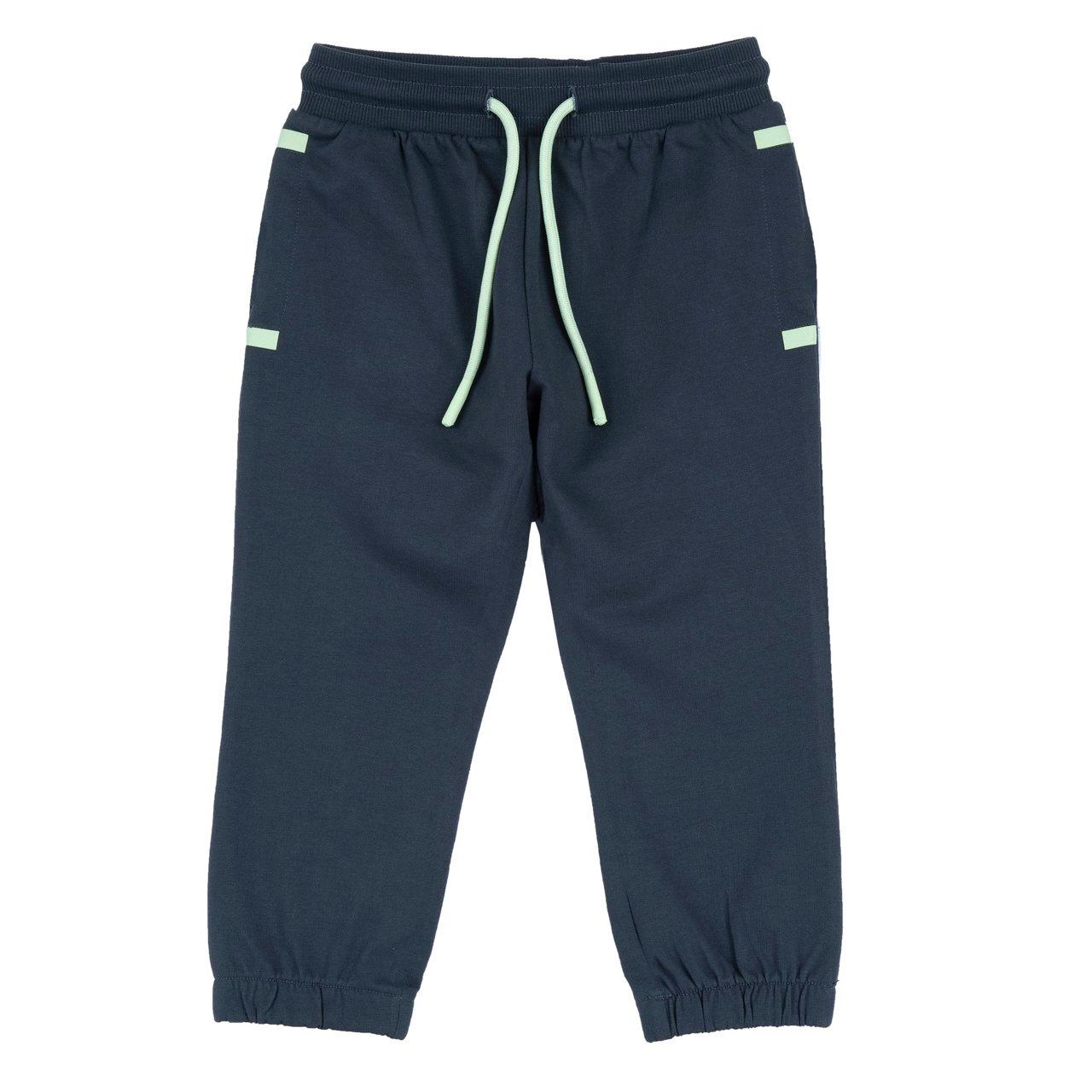 Pantaloni Lunghi | Chicco Pantaloni jogger Chicco verdi in felpa non garzata per bambino, con vita elasticizzata, cordino, tasche con stampa decorativa e elastico interno sul fondo gamba, ideali per autunno/inverno. | Chicco