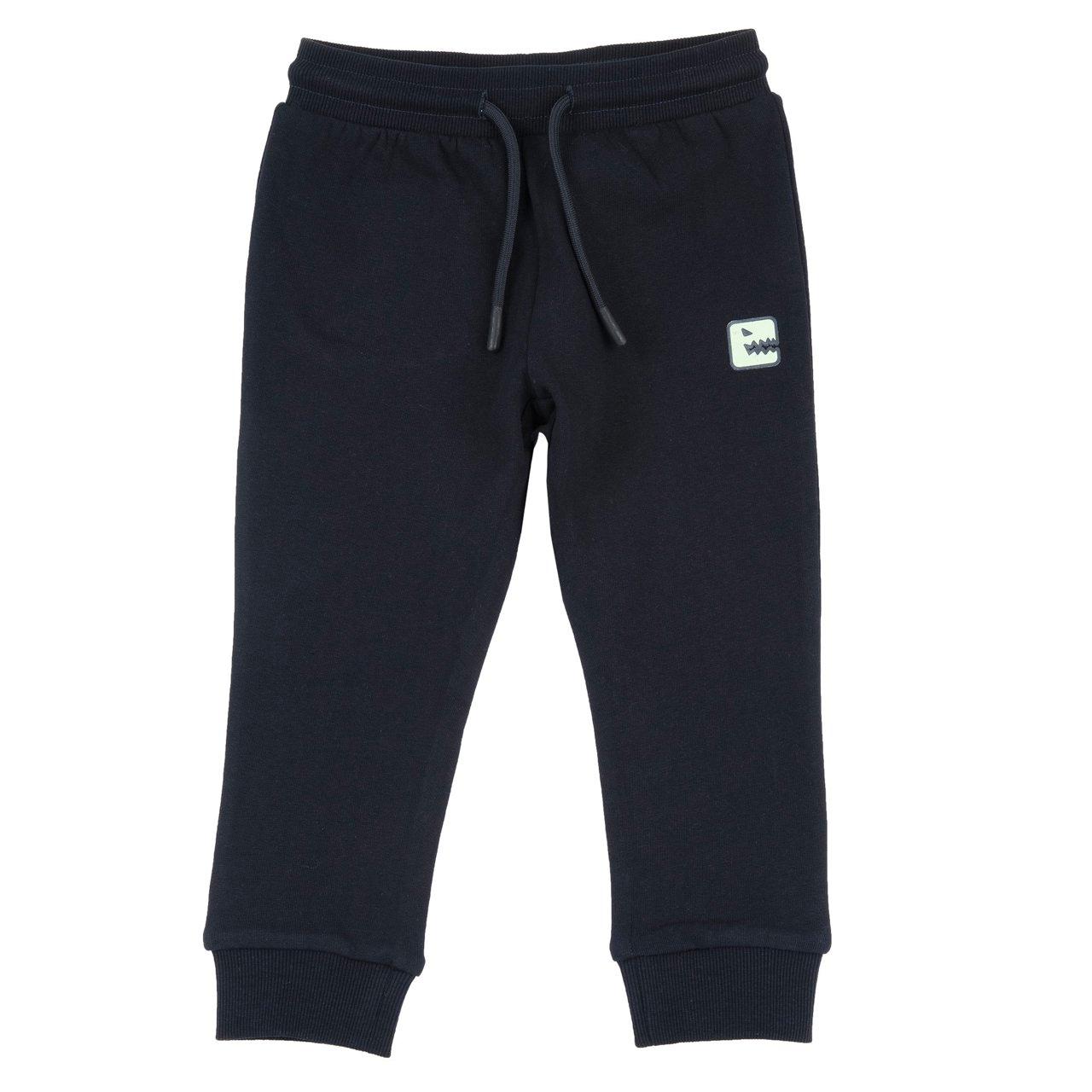 Pantaloni Lunghi | Chicco Pantaloni jogger Chicco verdi in felpa garzata per bambino, con stampa dinosauro gommata, vita elasticizzata e cordino, ideali per autunno/inverno. | Chicco